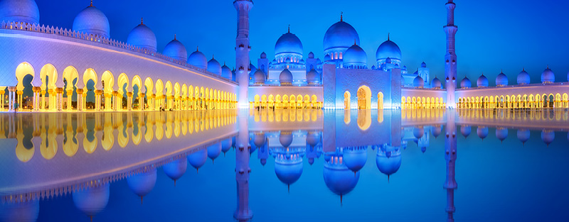 View of Abu Dhabi Skyline at sunset, United Arab Emirates.